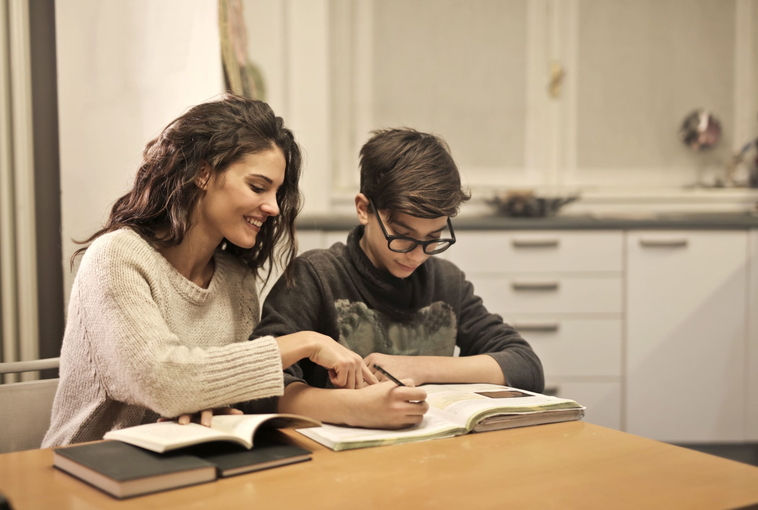 Creator helping a child study